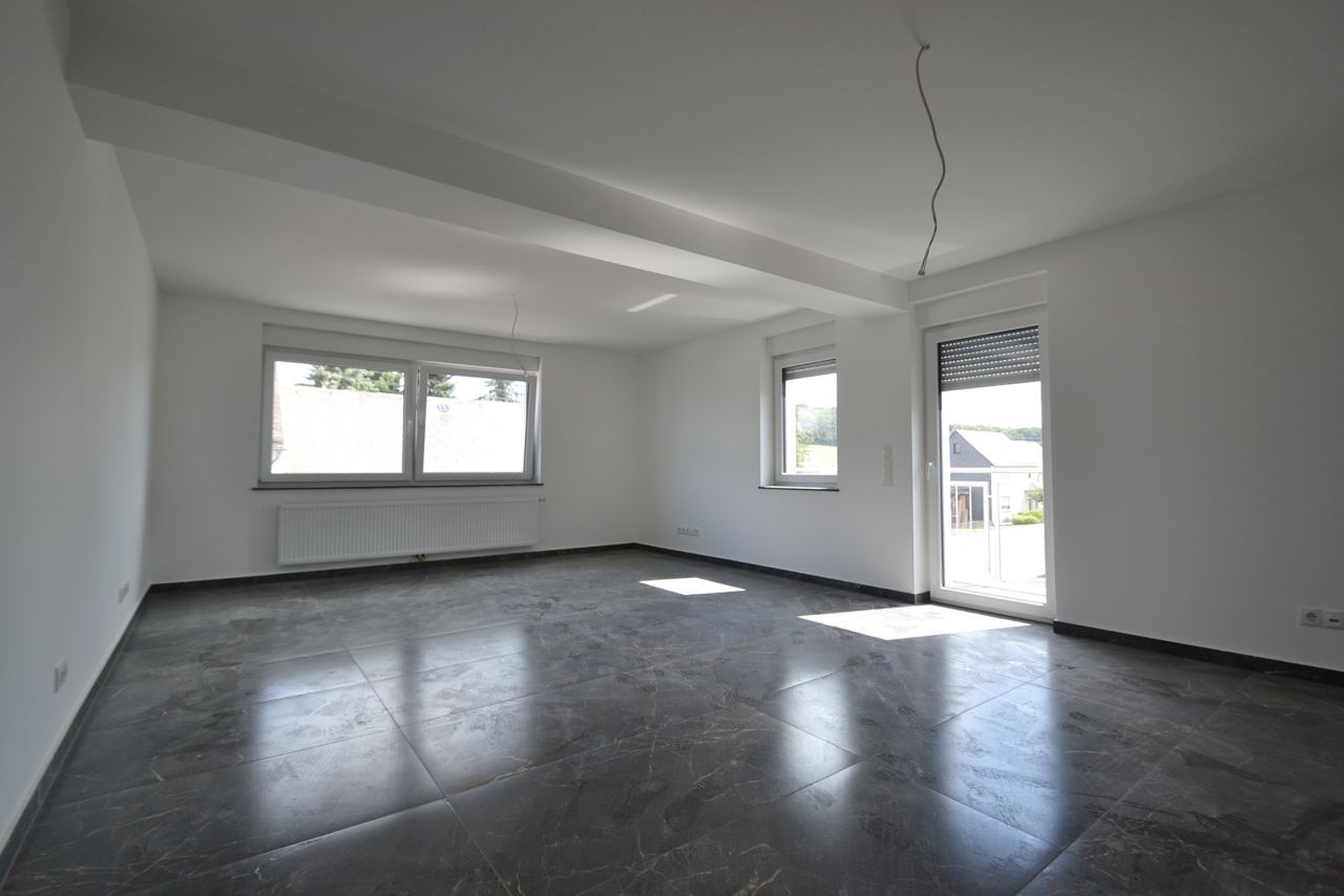 Wohnzimmer mit Ausgang Balkon